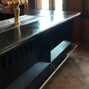 Coaten of impregneren van hardsteen